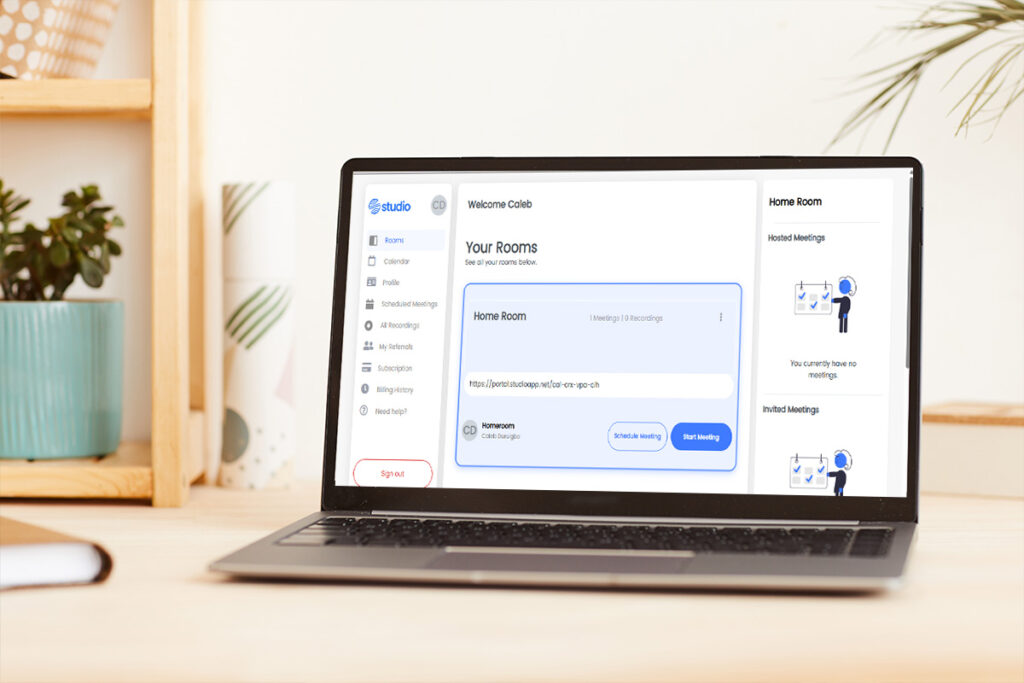Studio platform dashboard displayed on a laptop with meeting options
