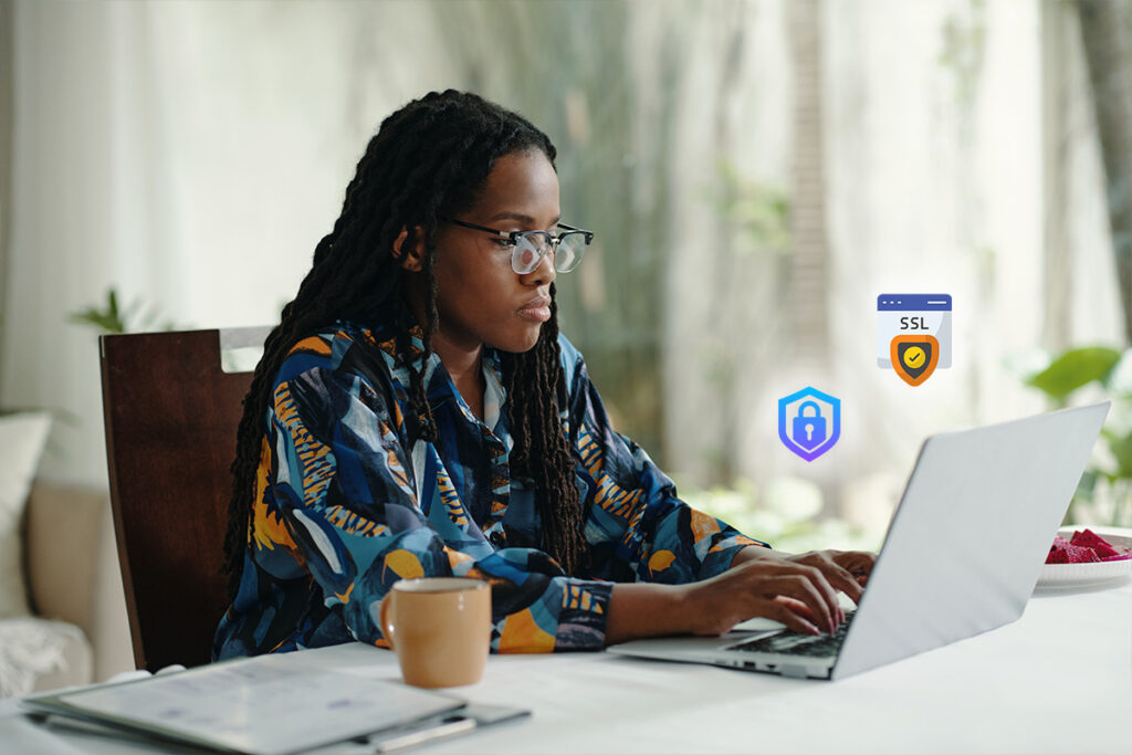 Woman using laptop with SSL and security shield icons
applicant submitting documents through a secure online admissions platform protected with SSL encryption and data security
