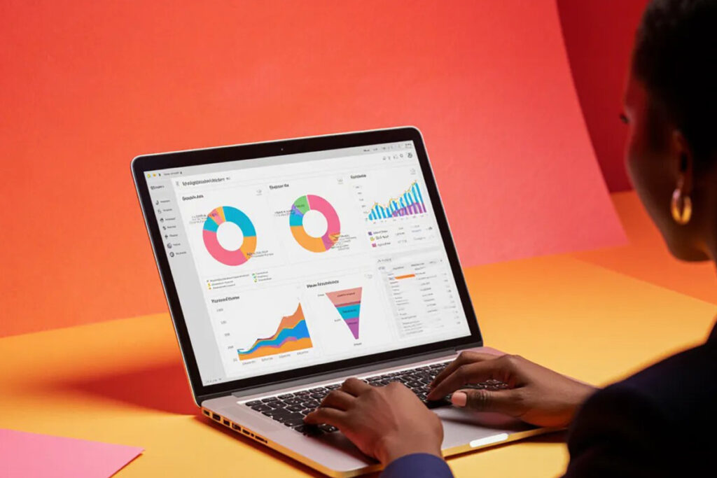 Person analyzing dashboards on a laptop with charts for admissions and performance, highlighting analytics inside a student information system for higher education.

