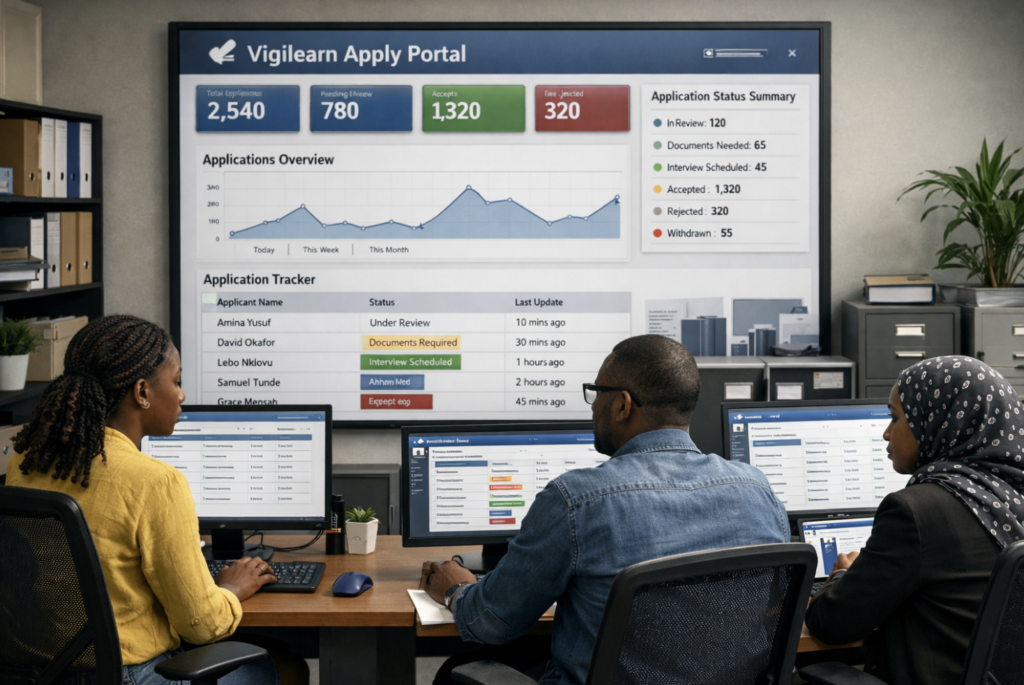 African university team using Vigilearn Apply Portal, real-time tracking of large number of applications, automated status updates visible on screen, calm and controlled office atmosphere showing scalable admissions operations